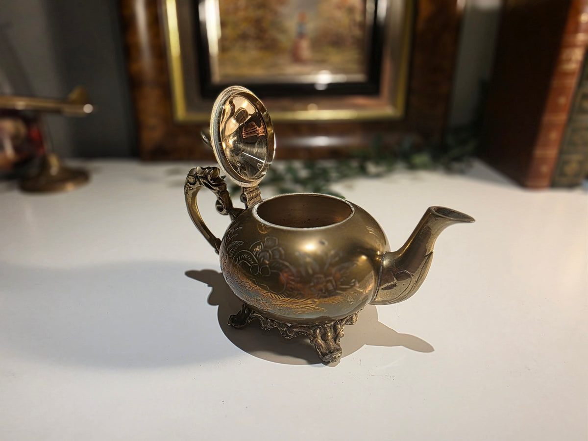 Antique-Style Brass Floral Engraved Teapot with Ornate Handle and Footed Base