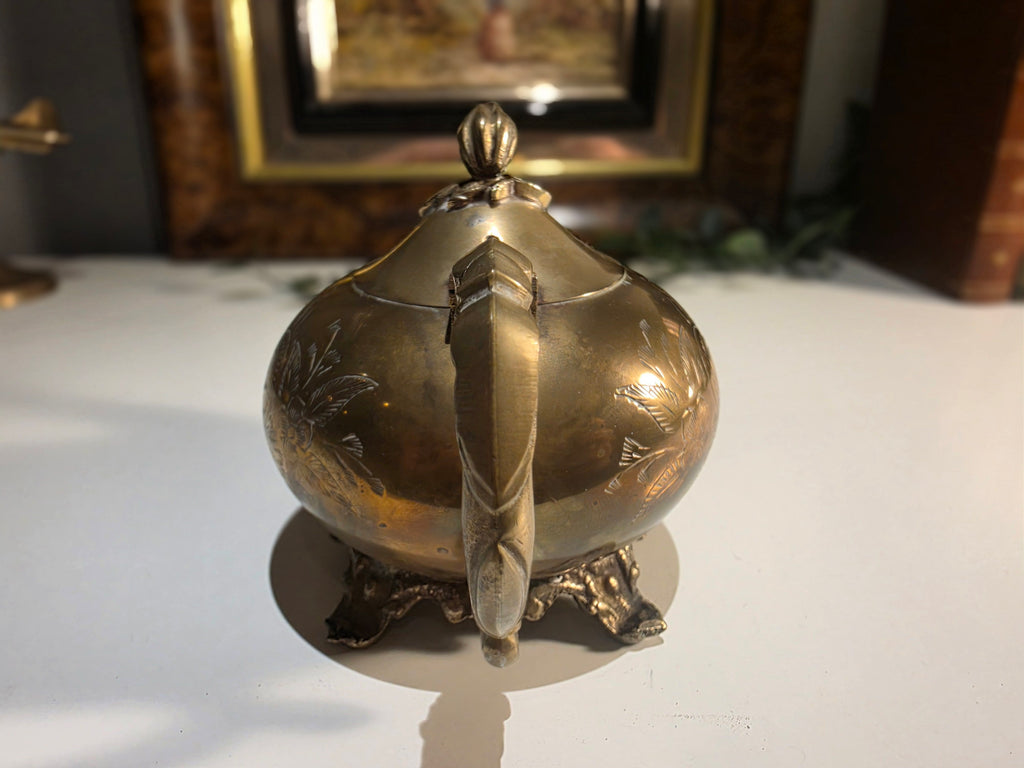 Antique-Style Brass Floral Engraved Teapot with Ornate Handle and Footed Base
